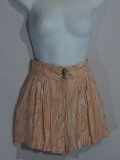 Here's a beachy, easy breezy pair of shorts you'll adore! These 80s high end Platinum label shorts have a comfy wide stretchy band ruched high waist with a back zipper and a roomy, lightweight flouncy shorts leg cut that's like a super mini skirt cut. The colors are unique like its high end tailoring in a peachy sandy shade with mossy brown tans swirled. This rare pare of summer vacation shorts are sweet and unique. You'll love them. Check out the measurements and photos! measurements taken zipp Vacation Shorts, Short Legs, Easy Breezy, Vintage Shorts, Summer Vacation, Swirl, Mini Skirt, Zip Ups, Ballet Skirt