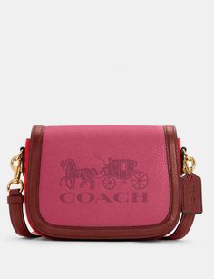 Coach C5776 Saddle Bag Horse & Carriage Colorblock Leather Bright Violet & Red Refined pebble leather Inside multifunction pocket Magnetic snap closure, fabric lining Outside open pocket Detachable strap with 22" drop for shoulder or crossbody wear 8" (L) x 6" (H) x 3 1/4" (W)  Please note the seller does NOT assess duties for an international orders, and import duties and taxes, which are the sole responsibility of you, the customer. Please contact your local customs office for details before m Designer Compact Travel Bags, Designer Compact Bag With Removable Pouch, Compact Red Travel Bag, Coach Leather Crossbody Wallet, Coach Leather Wallets With Detachable Strap, Designer Red Bags With Interior Card Slots, Designer Compact Pink Bag, Compact Coach Leather Bag, Compact Leather Coach Bag