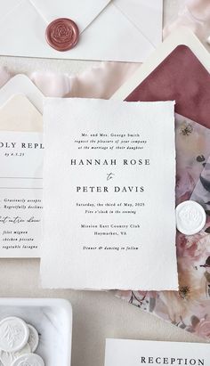 the wedding stationery is laid out and ready to be used