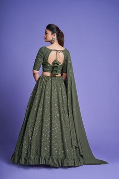 Make a statement in this 3-piece Green Diamond Georgette Thread & Sequins Embroidered Lehenga Choli Set, featuring a floor-length lehenga with 4 meters of flair, a Sweetheart Neck blouse, and a 2.30-meter Dupatta. The no-fuss outfit comes semi-stitched with a standard cancan and canvas attached; plus, customizations are available upon request. Dry Clean only and rock on, fashionista! No of Set - 3-piece set Color- Green Blouse Fabric - Diamond Georgette Blouse Sleeves-Regular Sleeves Size - 1 Me