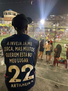 the back of a person's shirt at a baseball game