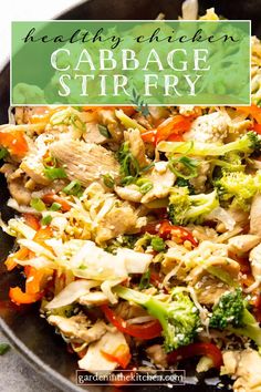 healthy chicken cabbage stir fry in a skillet with broccoli and carrots