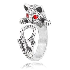 Our Alley Cat ring wraps around your finger and will keep you company all day. Just a little spooky with genuine red Austrian Crystal eyes. The body is etched to give a furry impression. You'll be sure to keep your spirits up with the purr-fect accessory! Keep your loved ones close with this cuddly-cute ring that stands out in a crowd. This wrap-style ring is a standard size 7 and can be gently adjusted for better fit. Also makes a great thumb ring! Many other adorable animals available in our A Animal Wrap Rings, Ring Cat, Wrap Around Ring, Normal Body Temperature, Pet Jewelry, Sweet Kitty, Alley Cat, Crystal Eye, Cat Ring