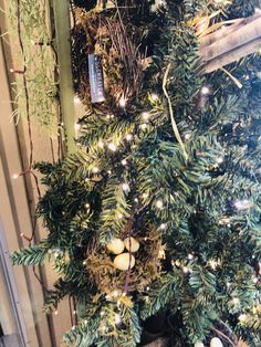 a christmas tree is decorated with lights and ornaments