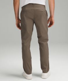 Welcome to the all-day comfort club. Previously known as the Commission Pant, we've removed the back-knee seam from these trousers for a more elevated look. Designed for Casual. You asked, we listened. Based on guest feedback, this classic fit still has a streamlined look from hip to hem, but now has a roomier feel in the glutes and thighs.:Our ABC technology uses an ergonomic gusset to remove tension from the crotch of our pants. Discreet zippered pocket on side seam. Back welt pockets with hid Lululemon Bottoms With Elastic Waistband And 4-way Stretch, Fitted Tapered Leg Pants By Lululemon, Versatile Relaxed Fit Lululemon Pants, Lululemon Fitted Tapered Leg Pants, Casual Mid-rise Bottoms By Lululemon, Casual Full-length Lululemon Pants, Fitted Lululemon Bottoms With Pockets, Casual Full Length Lululemon Pants, Lululemon Relaxed Fit Full Length Bottoms