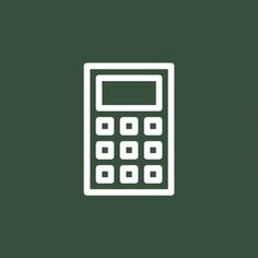 a white calculator on a green background