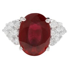 9.40 Carats Impressive Red Ruby and Natural Diamond 14K White Gold Ring Total Red Ruby Weight is: Approx. 8.50 Carats Ruby Treatment: Lead Glass Filling Ruby Measures: Approx. Approx. 13.65 x 10.00mm Natural Round Diamonds Weight: Approx. 0.90 Carats (color G-H / Clarity SI) Ring size: 6.5 (we offer free re-sizing upon request) Ring total weight: Approx. 5.6 grams Disclaimer: all weights, measurements and colors are approximate and may vary slightly from the listed dimensions or as seen in the i Lead Glass, 14k White Gold Ring, Leaded Glass, Red Ruby, White Gold Ring, Ring Diamond, White Gold Rings, Cocktail Rings, Diamond Rings