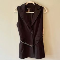 Beautiful Sleeveless Black Vest! Never Worn And New With Tags!! The Belt Does Have Some Wear From The Way It Was Stored However It Is Not Very Noticeable/ You Can Remove And Replace It With A Different Belt If Desired. One Button. Perfect For Work Or Easily Able To Dress Down Sleeveless Vest Outerwear For Office, Office Sleeveless Vest For Fall, Black Vest Outerwear For Night Out, Fitted Sleeveless Outerwear For Work, Sleeveless Vest Outerwear For Night Out, Chic Sleeveless Outerwear For Night Out, Faux Suede Vest, Faux Fur Vest Black, Suede Vest