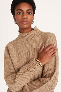 A timeless turtle neck sweater featuring our signature patchwork knit pattern, the VALAIS has a boxy fit and is crafted in a wool nylon blend. With chunky rib knit neck, cuffs and hem. Patchwork Knit, Kurta Patterns, Tiered Dresses, Turtleneck Sweaters, Tiered Tops, Thermal Sweater, Latest Sweater, Camel Sweaters, Merino Sweater