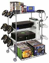 three tiered rack with dvd's and video equipment