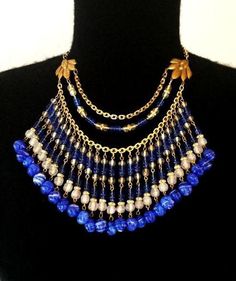 "You are viewing a gorgeous signed Miriam Haskell necklace. This heavy, MASSIVE, three level, cobalt royal blue and white art glass bib collar necklace is exquisite! Words can't describe how breathtakingly beautiful this necklace is! Treat you or a loved one to a gorgeous Miriam Haskell bib necklace today. This would be perfect to wear with day, evening or wedding attire. So rich and luxurious looking! You will certainly obtain numerous compliments while wearing this bold statement necklace...he Blue Lapis Lazuli Jewelry, 90s Necklace, Miriam Haskell Necklace, Indigo Art, Blue And White Art, Miriam Haskell Jewelry, Bold Statement Necklaces, Vintage Jewlery, Bib Collar