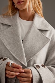 Meet your jackets of all trades: whatever your style, they’re up to the task. Keeping warm while looking cool? That’s their specialty . Transitioning seamlessly between seasons? They’re practically made for it. | Wool Blend Oversized Coat Jacket by Anthropologie in Grey, Women's, Size: 10, Polyester/Wool/Acrylic Winter Outerwear With Button Cuffs And Lapel Collar, Long Sleeve Outerwear For Cold Weather, Winter Outerwear With Button Cuffs For Cold Weather, Oversized Outerwear With Buttons For Cold Weather, Oversized Workwear Outerwear With Button Cuffs, Trendy Winter Outerwear With Button Cuffs, Oversized Outerwear With Button Cuffs For Work, Oversized Outerwear With Lapel Collar For Cold Weather, Classic Oversized Outerwear With Button Cuffs