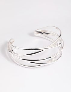 Description   Talk about silver linings! Silver accessories are perfect for creating a clean and classic look. This pretty bracelet features a timeless design. Pair it with black for a sophisticated finish. Black Bangle, Silver Linings, Diy Concrete, Flat Back Earrings, Concrete Planters, Pretty Bracelets, Silver Accessories, Timeless Accessories, Huggie Hoop Earrings