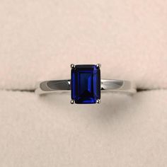 Unique wedding ring blue sapphire ring emerald cut blue | Etsy Platinum Sapphire Engagement Ring, Emerald Cut Sapphire Solitaire Promise Ring, Emerald Cut Solitaire Sapphire Promise Ring, Classic Octagon Lab-created Sapphire Ring, Rectangular Lab-created Sapphire Rings, Classic Emerald Cut Sterling Silver Sapphire Ring, Classic Emerald Cut Sapphire Ring In Sterling Silver, Classic Sterling Silver Sapphire Ring With Emerald Cut, Classic Blue Radiant Cut Emerald Ring