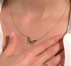 The Minimalist Butterfly Necklace is a delicate and elegant piece, perfect for adding a touch of charm to any outfit. Crafted with a sleek and simple design, this necklace symbolizes transformation and beauty. It's an ideal gift for your loved one, offering a timeless accessory that can be worn daily or on special occasions. Trendy Tarnish Resistant Charm Necklaces, Rose Gold Butterfly Necklace With Adjustable Chain, Trendy Simple Jewelry As A Gift, Trendy Simple Design Jewelry For Gifts, Dainty Clavicle Chain Jewelry As Gift For Mom, Dainty Collarbone Chain Jewelry As Gift For Mom, Tarnish Resistant Necklace For Mom, Adjustable Delicate Chain Butterfly Necklace, Adjustable Butterfly Necklace With Delicate Chain