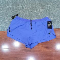 Nwt Men's Size Xl Nike Dri-Fit Aeroswift Running Shorts. They Have The Built In Underwear Support, Slits On The Sides, And 2 Small Pockets Along Inside Waistband. Color Is A Periwinkle (A Blueish Purple/Purplish Blue). Inseam Approx 2.25" Purple Activewear With Pockets For Sports, Purple Moisture-wicking Running Bottoms, Purple Moisture-wicking Bottoms For Running, Nike Stretch Athletic Shorts In Purple, Stretch Purple Nike Athletic Shorts, Nike Purple Athletic Stretch Shorts, Purple Athletic Shorts With Pockets For Sports, Sporty Purple Athletic Shorts With Pockets, Casual Purple Running Bottoms