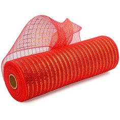 a roll of red mesh on top of a white surface with an orange ribbon around it