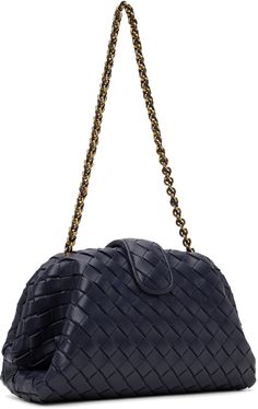 Intrecciato-woven buffed calfskin clutch in navy. · Fixed cable chain and leather shoulder strap · Magnetic press-stud tab at hinged closure · Lambskin interior · H6.5 x W11.5 x D4 Supplier color: Duke Luxury Evening Clutch With Intrecciato Weave, Formal Woven Leather Clutch, Evening Woven Leather Shoulder Bag, Bottega Veneta Intrecciato, Press Studs, Cable Chain, Bottega Veneta, Calf Skin, Shoulder Strap