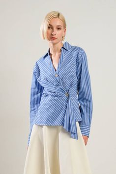 A striped woven shirt featuring shirt collar, long sleeve and side closure Details: Self : 100% Cotton Size & Fit - Model is 5`8" And Wearing Size Small- Measurements Taken From Size Small- Approx. Length: 24" Luxury Striped Dress Shirt For Semi-formal Occasions, Blue Long Sleeve Blouse With Vertical Stripes, Pinstripe Long Sleeve Blouse For Summer, Blue Long Sleeve Tops With Vertical Stripes, Striped Shirt For Office In Spring, Blue Vertical Stripe Blouse For Spring, Blue Lapel Collar Top For Spring, Spring Blue Blouse With Vertical Stripes, Blue Tops With Lapel Collar For Spring