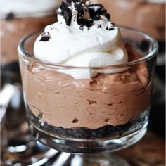 two desserts in small glass dishes on a table