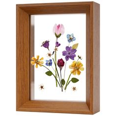 a wooden frame with flowers in it on a white background and the image is framed