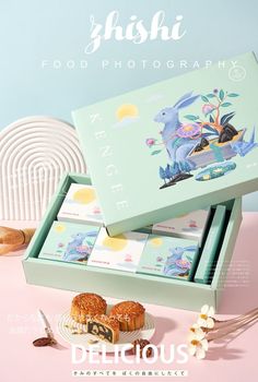 an open box with pastries on it and the words fuji food photography written in japanese