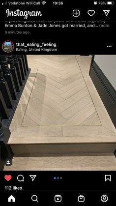 an instagram page on the bottom of a wooden table