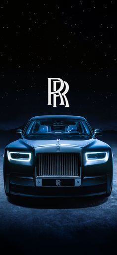 the front end of a rolls royce car with an r logo on it's hood