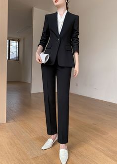 Elevate your professional wardrobe with our Celia Black Single Breasted Blazer & Cropped Pants Suit Two-Piece Set. Made with high-quality materials, this set exudes luxury and sophistication. The single-breasted blazer with a single button closure and cropped pants add a touch of femininity to this high-end, professional ensemble. Perfect for spring and autumn, this set will make you feel like a goddess in a high-end boutique. Blazer: One button closure Notched lapels Long sleeves Front flap poc Girls Blazers, One Button Blazer, Single Breasted Blazer, Business Outfits Women, Professional Wardrobe, Pantsuits For Women, Classy Dress Outfits, Stylish Work Outfits, A Goddess