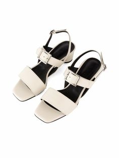 - Buckle detail sandals- Adjustable back ankle straps- Mid heelsMeasurements(in.)- Height: 1.6in.- KR220 - KR255- Please refer to the size chart- Fits true to the size, but if you have wide feet, we recommend buying half size upComposition- Cow skinDesigner- Made in Korea- by NONETHELESS- Style#:300678814 Summer T-strap Sandals With Stacked Heel And Ankle Strap, Modern Sandals With Buckle Closure Medium Width, Elegant Wedge Sandals With Buckle Closure And Block Heel, Ankle Strap Wedge Sandals With Sculpted Heel, Elegant Wedge Sandals With Buckle And Block Heel, Chic T-strap Sandals With Buckle Closure And Block Heel, Low Heel Sandals With Buckle Closure, Modern Square Toe Slingback Pumps For Summer, Modern Block Heels With Ankle Strap And Buckle