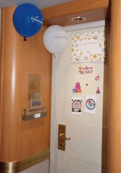 a door with some balloons on it