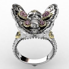 Own the dexterity, charm, and lightness of a butterfly thanks to this butterfly skull ring. this piece will allow you to have a distinctive style in keeping with your character. Salutations to all of our beautiful ladies, do you want to add a new jewel to your collection that has a gothic look but also has a cute side to it? Well then we got what you need right here with this butterfly skull ring, it has astonishing detailing with two big butterfly wings, gorgeously sculpted and decorated with v Butterfly Skull, Gothic Looks, Biker Jewelry, Pink Gem, Skull Jewelry, Keith Richards, Lady Biker, Pink Gemstones, Skull Ring