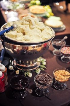 an assortment of desserts and condiments on a table