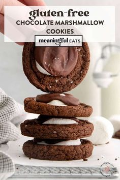 chocolate marshmallow cookies stacked on top of each other with the text gluten - free chocolate marshmallow cookies