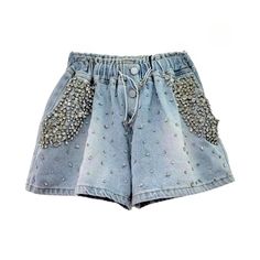 Crystal rhinestone women's denim shorts online—incredible jean shorts from the 2023 Summer Collection. Immerse yourself in the nostalgic charm of the Y2k denim trend. This sought-after fashion trend enhances your look with sophistication and a hint of the past, ensuring you remain in the spotlight.Embellished denim is a stylish and stylish way to add a one-of-a-kind touch to any outfit. It is the perfect way to spruce up a simple item of clothing and improve your flair to the next level. Decorat Rhinestone Shorts, Jeans Overall, Embroidered Denim Jacket, Heavy Industry, Jeans Cargo, Denim Patterns, Embellished Denim, Maxi Robes, Jeans For Short Women