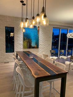 a large wooden table sitting in the middle of a room