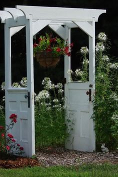 an image of a white garden shed with flowers growing out of it and the words keep your home protected