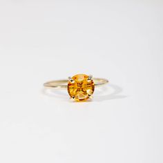 Citrine ring in 14K solid gold.  A modern and timeless ring with a natural Citrine yellow gemstone. A perfect gold ring for women, dainty and subtle that adds glam to every outfit. Citrine is November birthstone, so it is a great birthday gift for her. 100% handcrafted with love! ● Metal: 14K solid gold, 14K white gold ● Gemstone: Citrine, briolette cut ● Stone Diameter: 8 mm (0.3 in)  ● Choose from the drop down menus the available options (Material, Ring size) and leave us a note for any special requirements. ● All our pieces are delivered beautifully packaged and gift ready, with a certificate of authenticity for the metal and the stone.  Please keep in mind that each item is handcrafted and we need 3-5 days at least for its production. If you need your order on a specific date, please 14k Gold Yellow Sapphire Ring, Classic Yellow Gold Ring With Yellow Sapphire, Classic Yellow Gold Yellow Sapphire Ring, Classic Yellow Sapphire Yellow Gold Ring, Modern Gold Birthstone Ring With Gemstone, Modern Gold Gemstone Birthstone Ring, Dainty 14k Gold Topaz Gemstone Ring, Citrine Birthstone Ring For Anniversary, Modern Gold Topaz Birthstone Ring