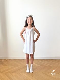 Girls linen summer sleeveless strappy dress. Perfect for both everyday wear and parties. Handmade. All seams are finished to a high standard. We use only Oeko-Tex certified European fabrics. Composition: - 100% European stonewashed linen fabric Oeko-Tex certified linen Color: - White - Powder Pink rope Sizes: - EU 92-98 cm / US 2-3 - EU 98-104 cm / US 3-4 - EU 104-110 cm / US 4-5 - EU 110-116 cm / US 5-6 - EU 116-122 cm / US 6-7 - EU 122-128 cm / US 7-8 Care instruction: - machine wash, gentle c Summer Sleeveless Cotton Suspender Dress, Cotton Sleeveless Suspender Dress For Vacation, Sleeveless Cotton Suspender Dress For Beach, Sleeveless Cotton Sundress, Sleeveless Cotton Suspender Sundress, Summer White Sleeveless Suspender Dress, White Beach Suspender Dress For Summer, White Summer Beach Suspender Dress, White Sleeveless Summer Suspender Dress