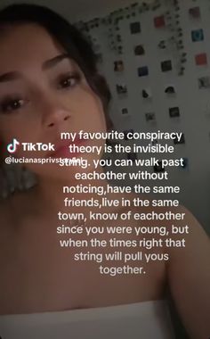 a woman is looking at the camera with her hand on her face and an ad for tiktok