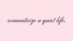 the words romantice a quiet life are written in black ink on a pink background