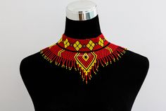 African wedding necklace, Zulu necklace, Beaded shawl necklace, African jewelry, Masai necklace, Bridesmaid necklace, Wedding gift 100% handmade using fine beads. Closure: ball joint Color: red and yellow 3-5 days delivery via DHL Express The shipping fee is for the first item only and additional item(s) ship for free. To continue shopping click here: timanacrafts.etsy.com Handmade Red Beaded Necklaces For Wedding, Traditional Wedding Necklaces With Bead Caps, Traditional Wedding Necklace With Bead Caps, Handmade Red Bridal Necklace With Round Beads, Bohemian Yellow Necklaces For Wedding, Handmade Yellow Necklaces For Wedding, Masai Necklace, Zulu Necklace, African Beaded Necklace