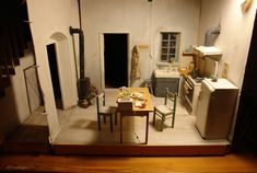 a miniature model of a kitchen and dining room