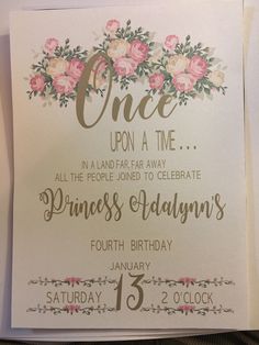 an open card with flowers on it that says once upon a time