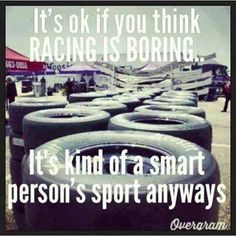 there are many tires lined up on the ground with a quote above them that says, it's ok if you think racing is boring it's kind of a smart person's sport always