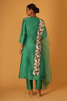 Green chanderi kurta with all over hand embroidery in floral pattern. Paired with a pant and dupatta with contrast hand embroidered border. - Aza Fashions Tussar Silk Sets With Sheer Dupatta In Traditional Drape, Silk Palazzo Set With Traditional Drape, Festive Tussar Silk Sets For Reception, Bollywood Style Tussar Silk Sets With Sheer Dupatta, Designer Tussar Silk Palazzo Set With Sheer Dupatta, Tussar Silk Sets With Sheer Dupatta For Eid, Silk Palazzo Set With Sheer Dupatta For Diwali, Tussar Silk Sets For Reception And Navratri, Cotton Silk Salwar Kameez With Traditional Drape For Reception