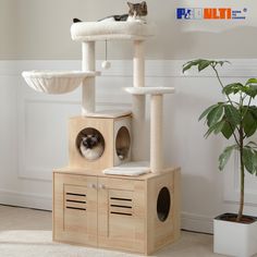 a cat sitting on top of a wooden scratching tower next to a potted plant