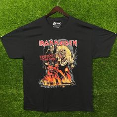 This Black "Iron Maiden The Number Of The Beast Soundtrack" T-Shirt From Urban Outfitters Is Size Xl. It Measures 23 Inches Pit To Pit And 31 Inches In Length, Perfect For All Hardcore Fans. Black Color Iron Maiden The Number Of The Beast Soundtrack Design Brand: Urban Outfitters Size: Xl Measures 23 Inches Pit To Pit Length: 31 Inches Size: Mens Xl Condition: New Without Tags Black Cotton T-shirt By Urban Outfitters, Urban Outfitters Grunge T-shirt For Streetwear, Urban Outfitters Grunge Short Sleeve Tops, Urban Outfitters Black Crew Neck T-shirt, Urban Outfitters Black Cotton T-shirt, Black Graphic Tee By Urban Outfitters, Urban Outfitters Black Grunge Top, Urban Outfitters Graphic Tees, Urban Outfitters Shirts