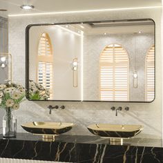 two sinks in front of a large mirror with shutters on the windows behind them