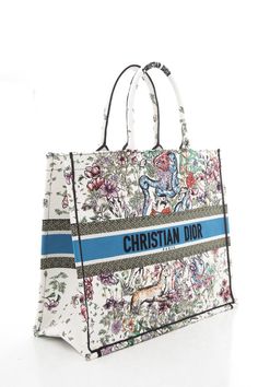 Dior White Floral Woodland Embroidered Book Tote Handbag. This item is in very good condition.Length: 16.25"Depth: 7"Height: 13.5"    Brand = Dior  Color = White Floral  Condition = Pristine    Item Number:  4257-1823  Item ID:  166824  Category:  Handbag Christian Dior Book Tote, Christian Dior Logo, Dior Aesthetic, Dior Book, Christian Dior Paris, Book Tote Bag, Dior Logo, Dior Book Tote, Embroidered Canvas